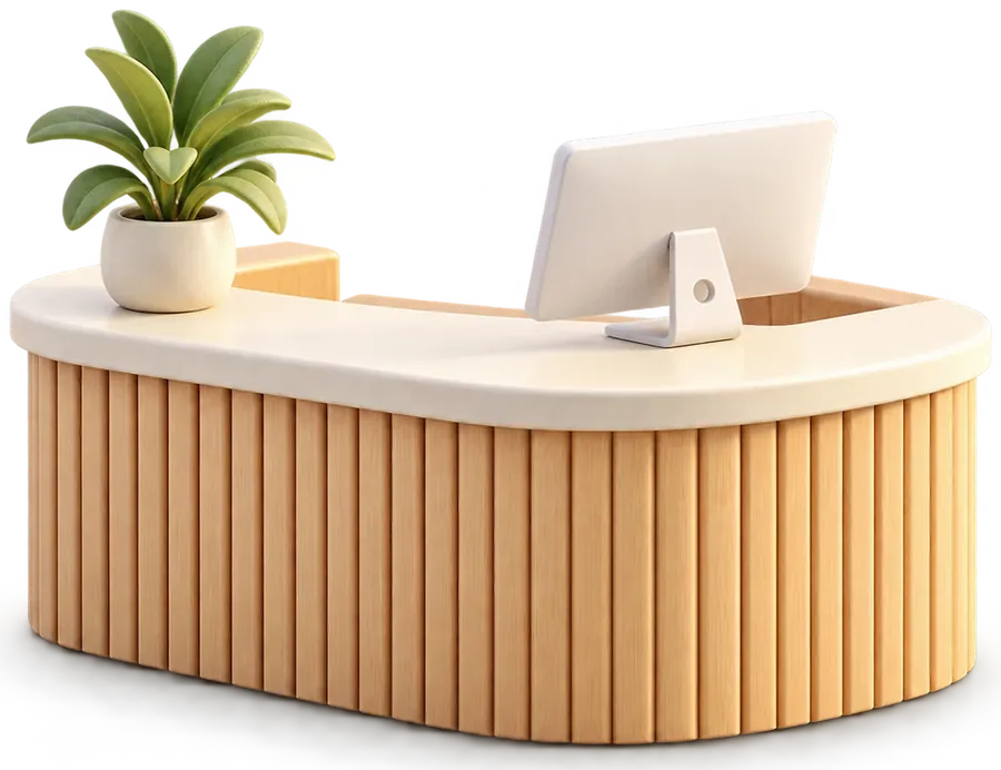 A miniature reception desk in pale fluted wood with a monitor and a potted plant
